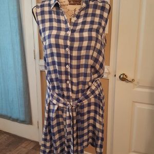 Knee length sleeveless button front dress